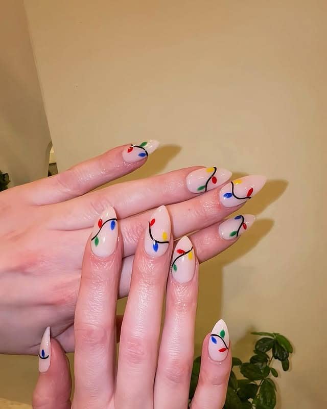 3. Minimalist Pastel Christmas Lights on Nude Almond Nails - christmas lights nail ideas