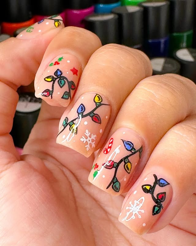 14. Holiday Lights and Snowflakes on Short Nude Nails - christmas lights nail ideas