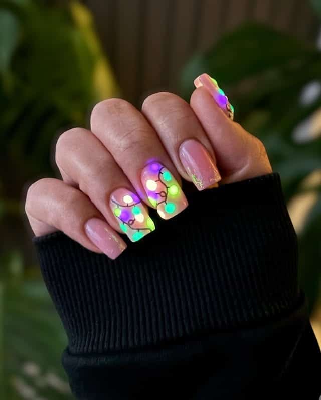 16. Glowing Neon Christmas Lights on Soft Pink Square Nails - christmas lights nail ideas