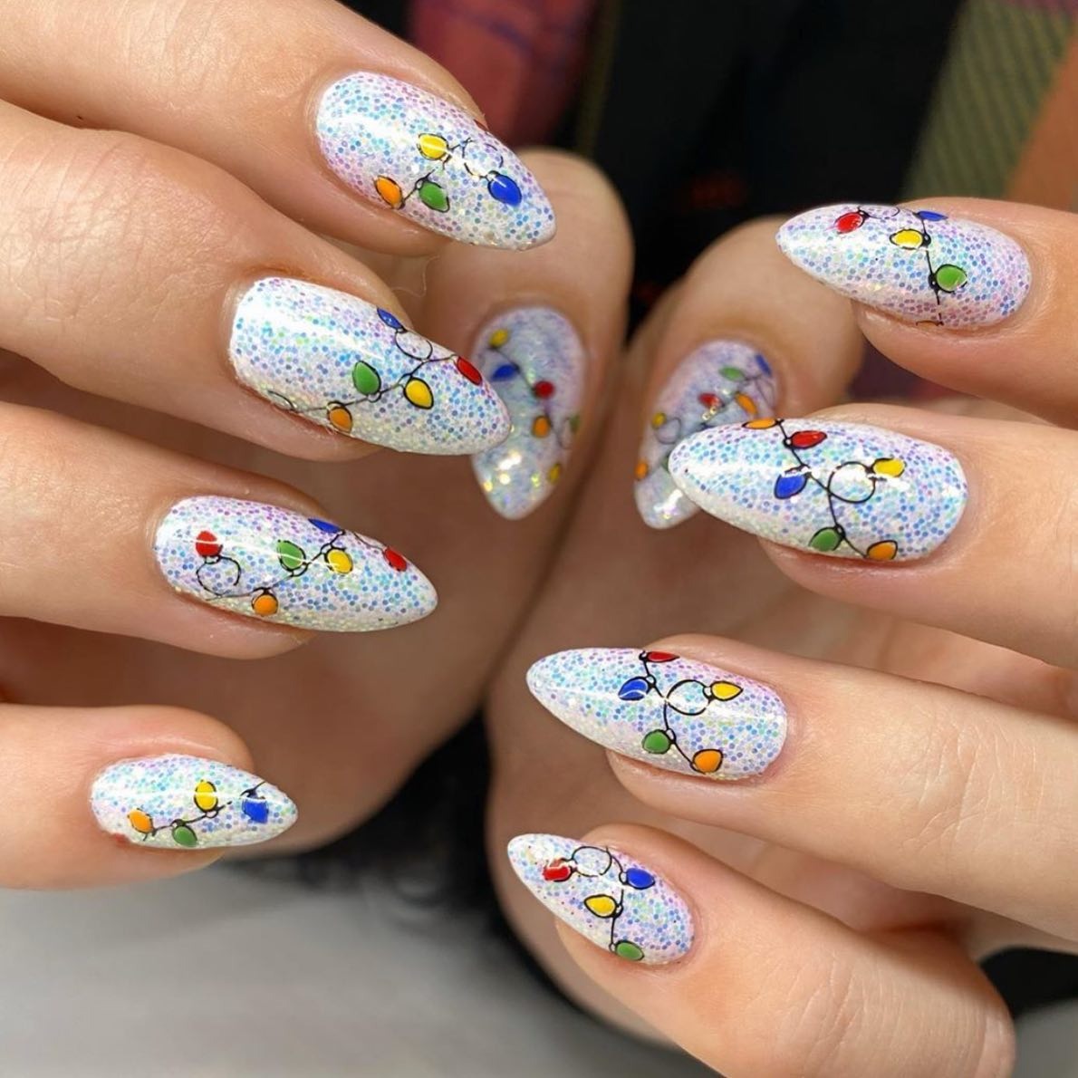 21. Iridescent Snowfall Nails With Multicolor Christmas Lights - christmas lights nail ideas