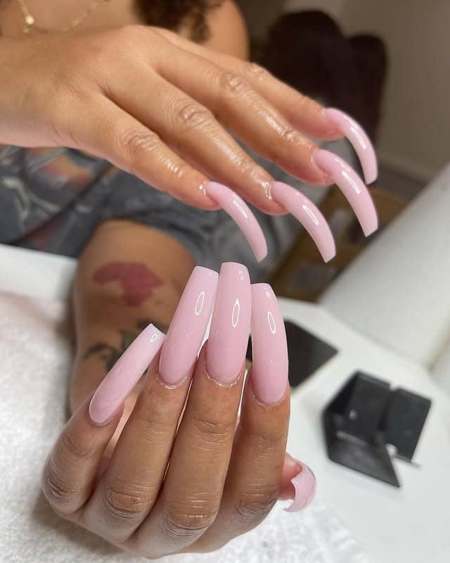 12. Baby Pink High-Gloss Curved Coffin Nails - curved nail ideas
