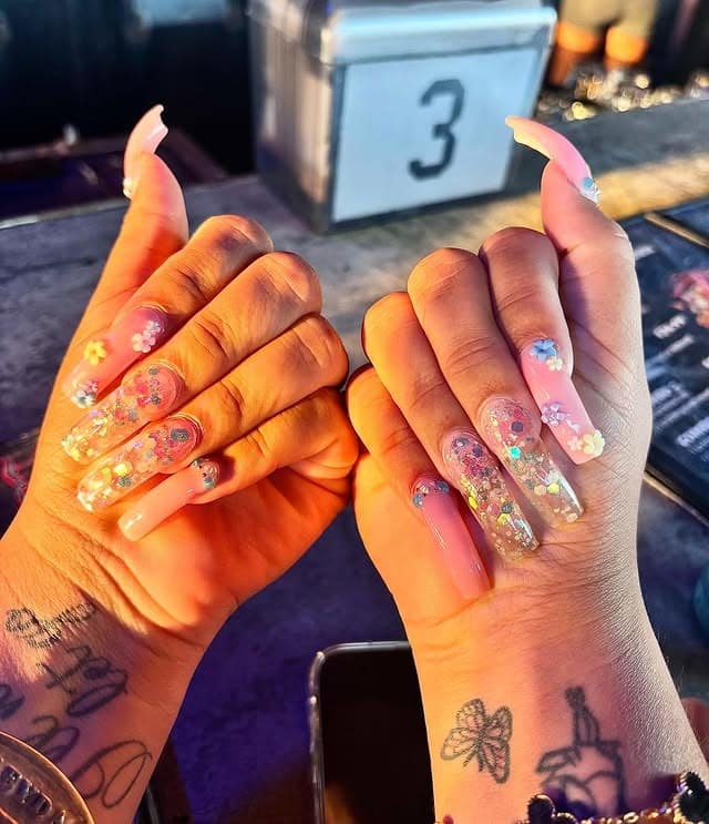 14. Curved Floral Glitter Nails with Pastel Base - curved nail ideas