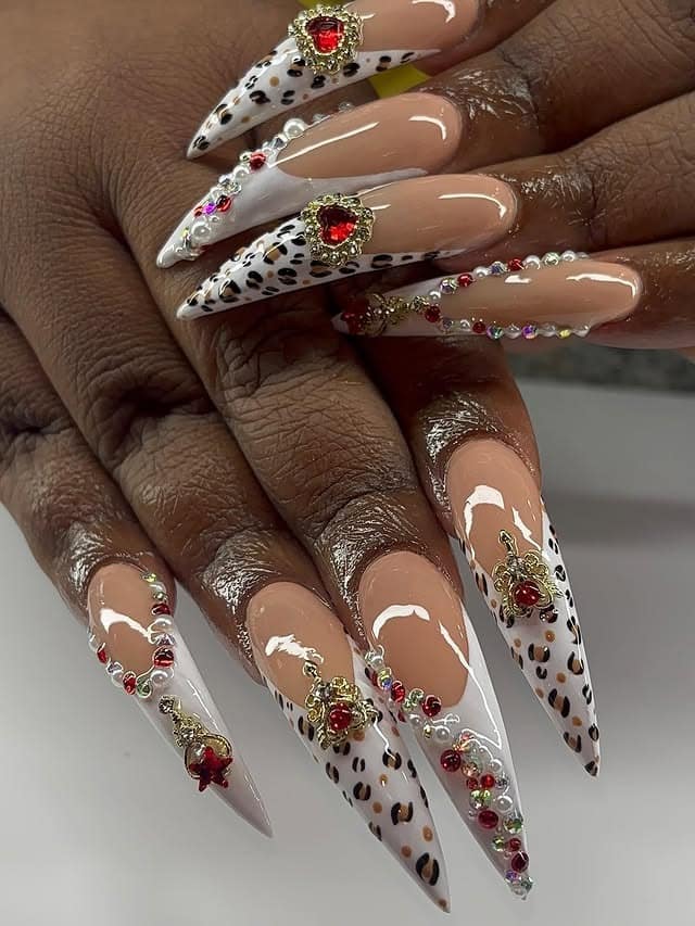 19. Leopard Curve Stiletto Nails with Red Gem Details - curved nail ideas