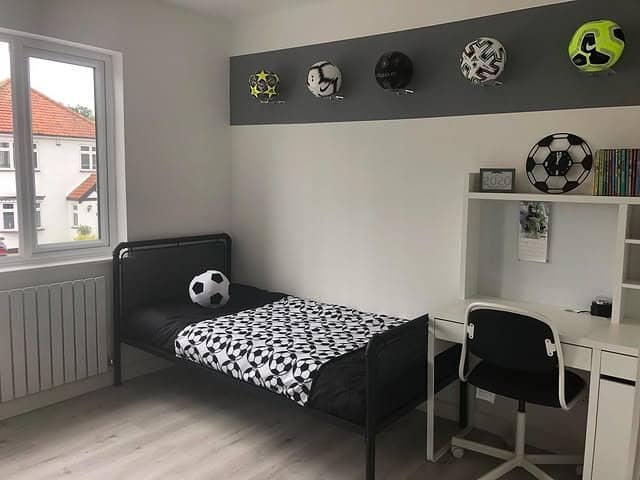 1. Monochrome Football Minimalist Room - football bedroom ideas