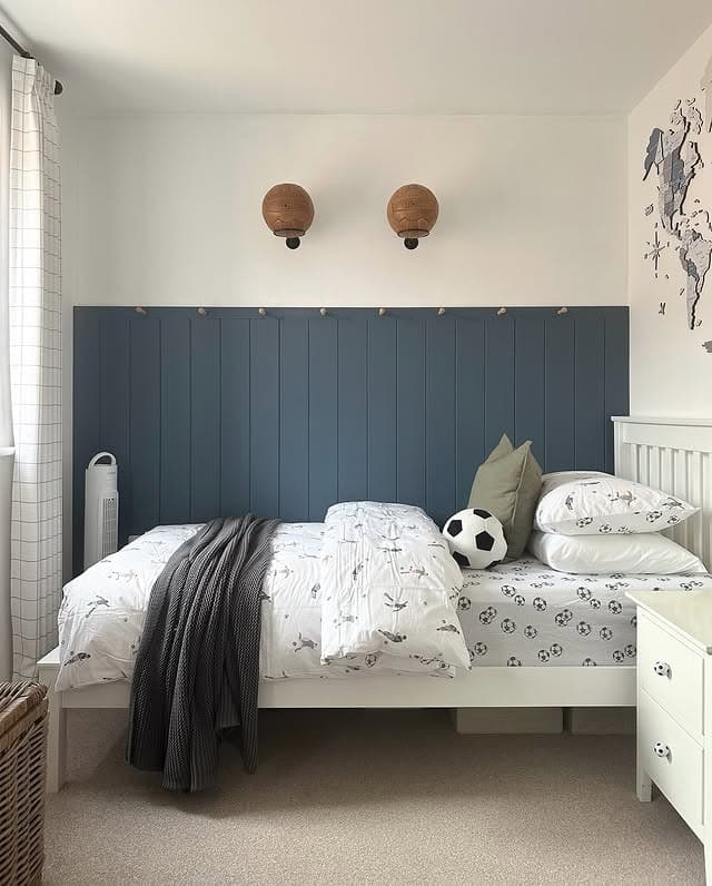 10. Blue Panel Board with Subtle Football Bedding - football bedroom ideas