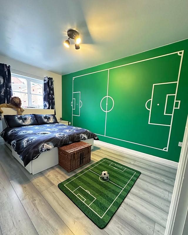12. Green Pitch Wall Feature with Modern Layout - football bedroom ideas