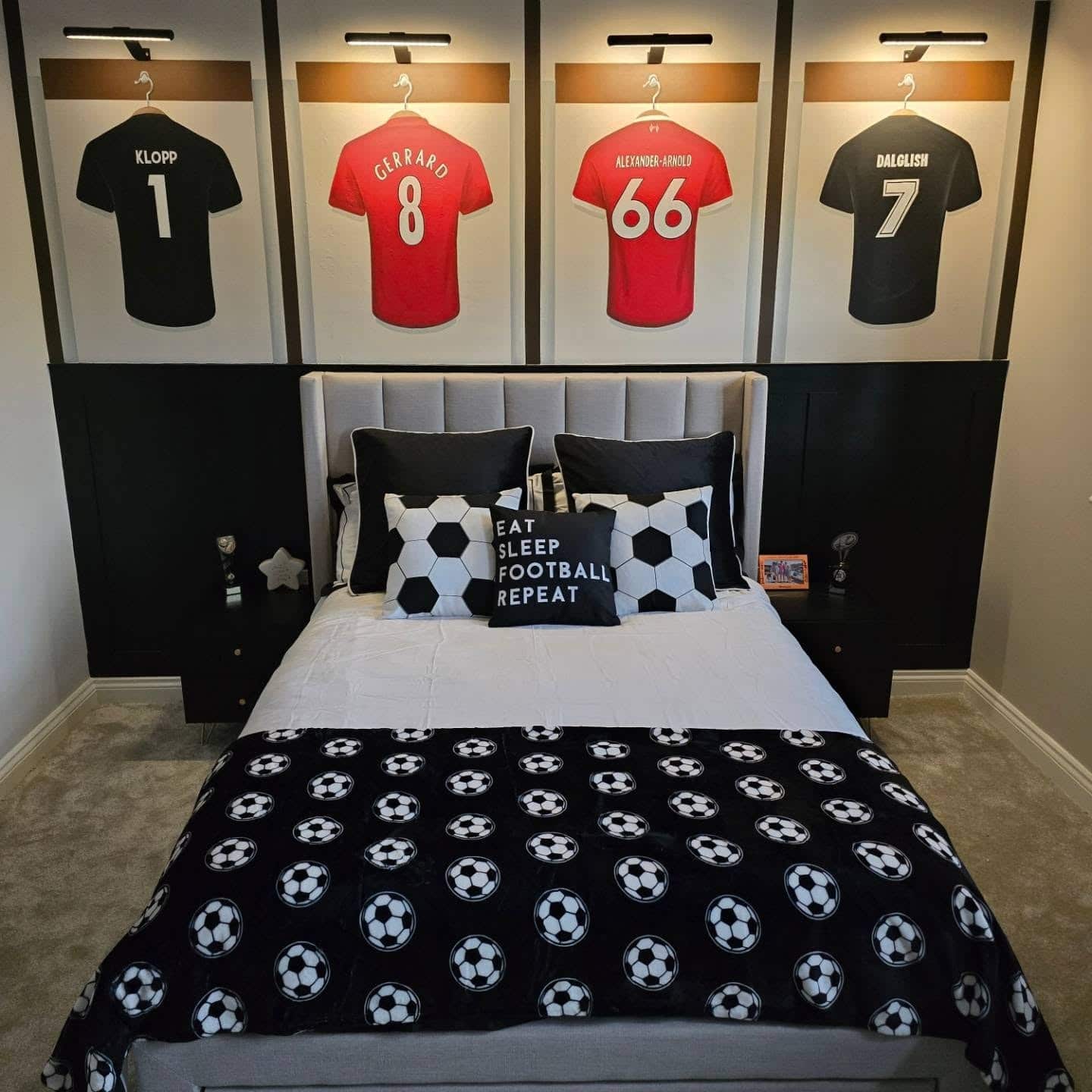 16. Locker-Room Style Feature Wall in Black and Stone - football bedroom ideas