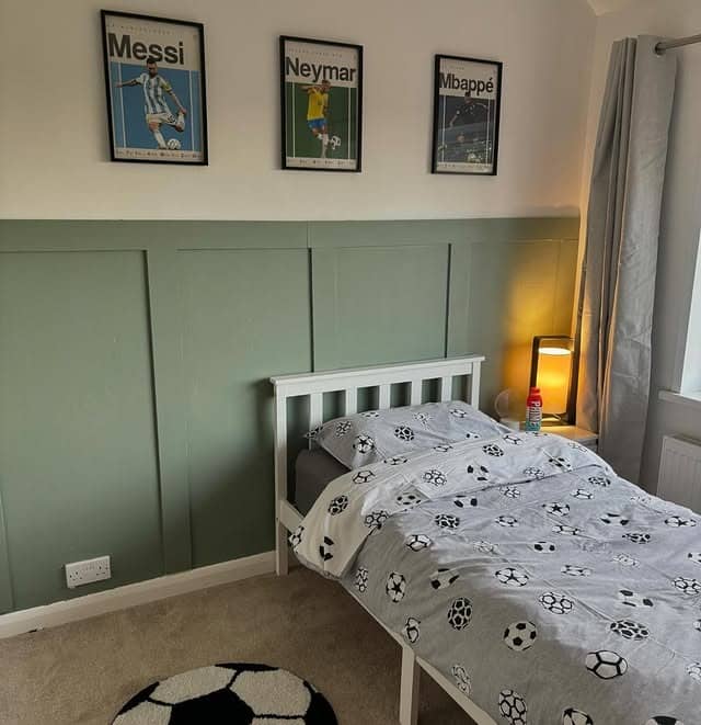 17. Soft Green Panelling with Football Icon Artwork - football bedroom ideas