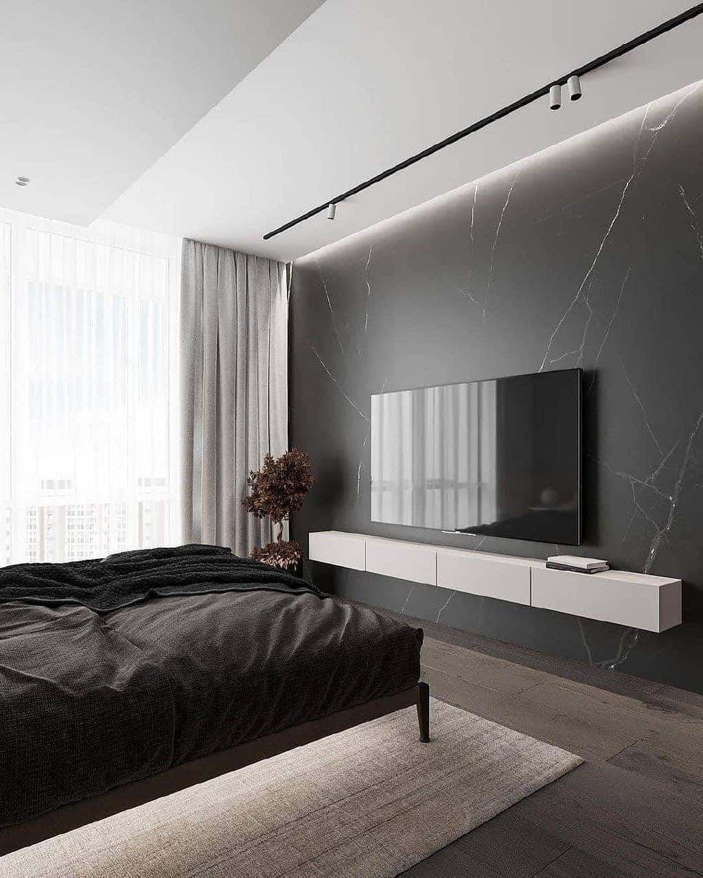 7. Marble-Veined Graphite Accent Wall with Minimalist Console - grey wall bedroom ideas