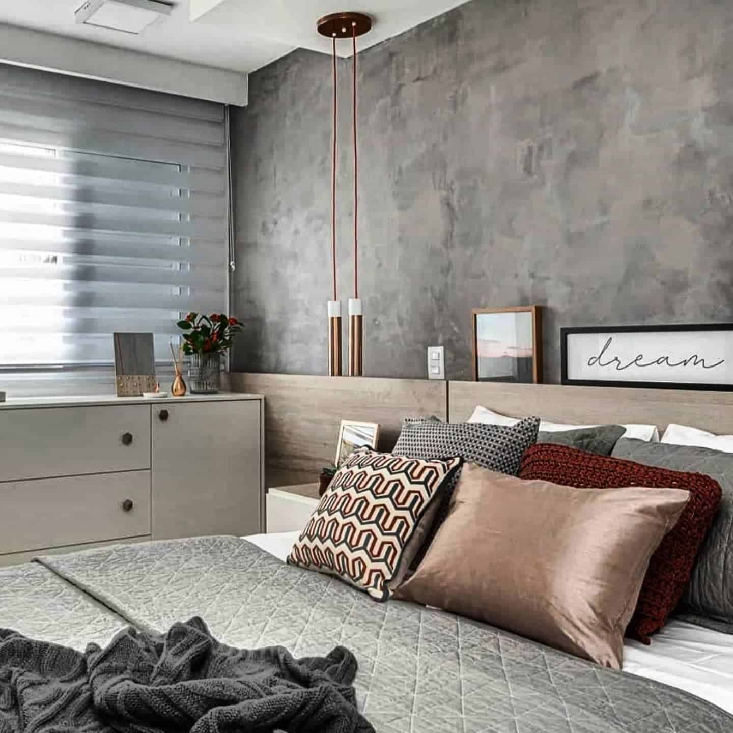 10. Textured Cement Grey with Copper Accent Lighting - grey wall bedroom ideas