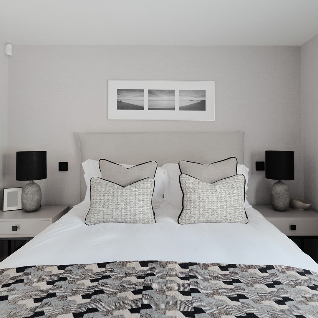 15. Pale Dove Grey Harmony with Monochrome Art - grey wall bedroom ideas