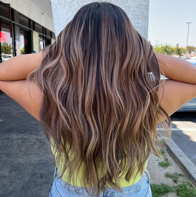 9. Cool-Toned Light Brown With Extended Beach Waves - Light Brown Hair Color