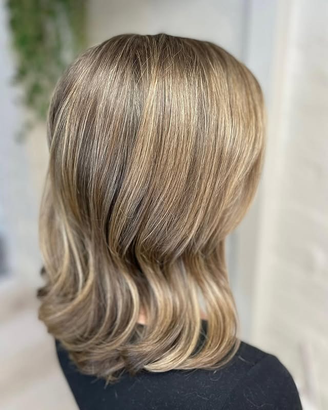 16. Blended Light Brown and Blonde Soft Layers - Light Brown Hair Color
