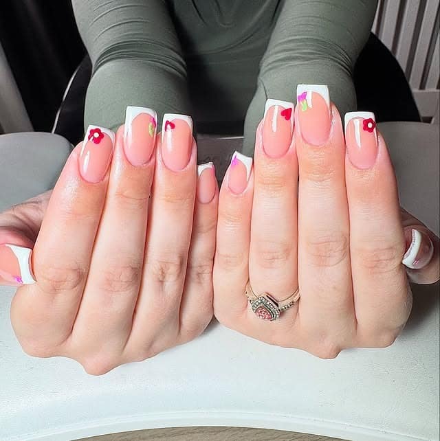 15. Square French Tips with Colorful Floral Accents - cute french nail ideas