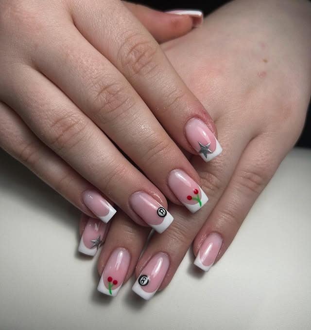 17. Graphic French Tips with Mixed Mini Icons - cute french nail ideas
