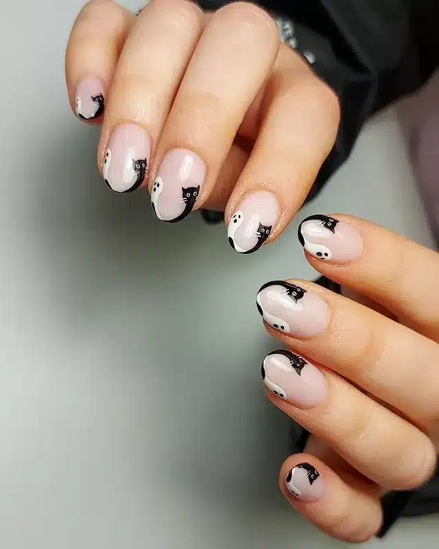 19. Black and White Cat-Themed French Tips - cute french nail ideas