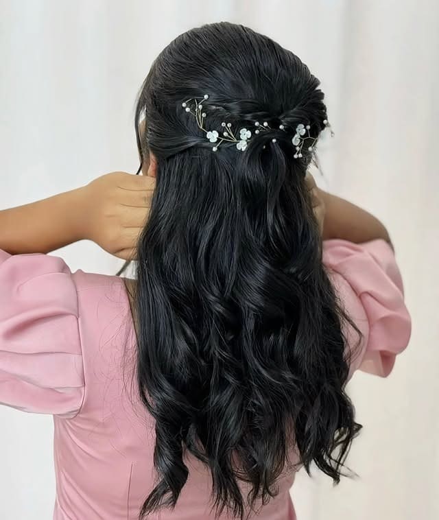 15. Dark Wavy Half-Up with Floral Accents - Simple Hairstyles