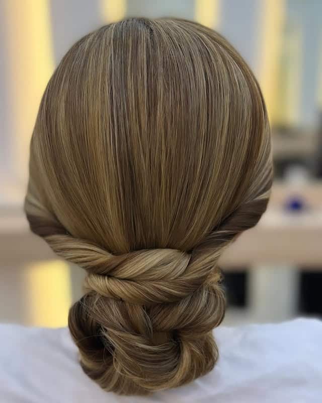 22. Twisted Low Bun in Golden Beige - Simple Hairstyles