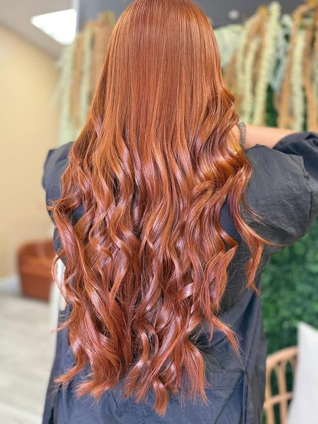 2. Glossy Copper Lengths with Sculpted Waves - Copper Hair Color
