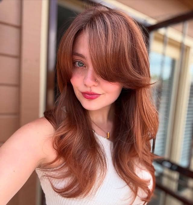 9. Face-Framing Copper Layers with Feathered Ends - Copper Hair Color