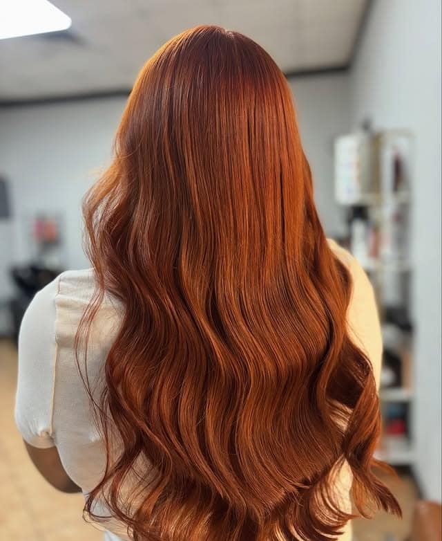 11. Fluid Copper Waves on Long Hair - Copper Hair Color