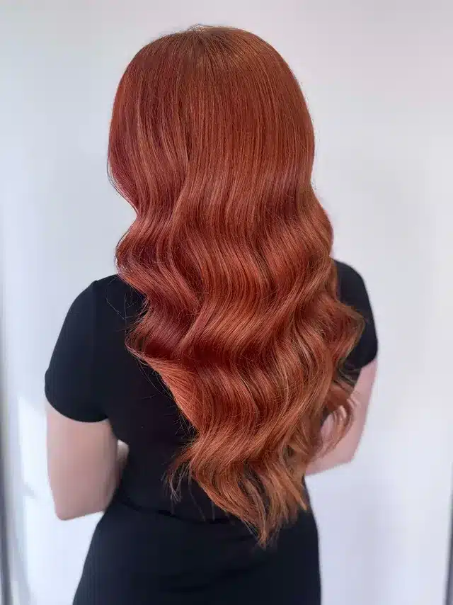 12. Sculpted Copper Waves with Soft Gradient - Copper Hair Color