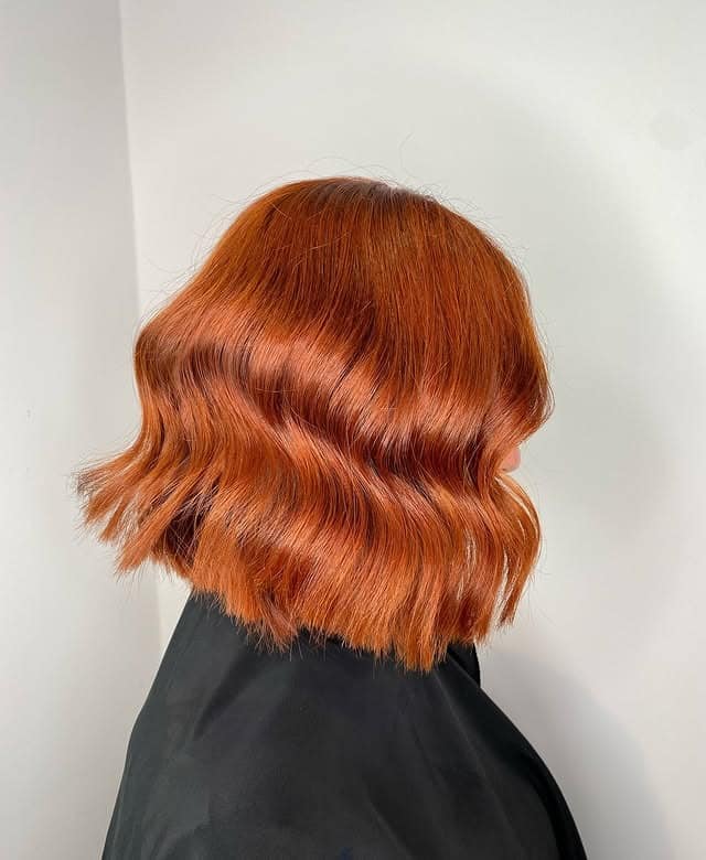 22. Glossy Copper Wavy Bob - Copper Hair Color