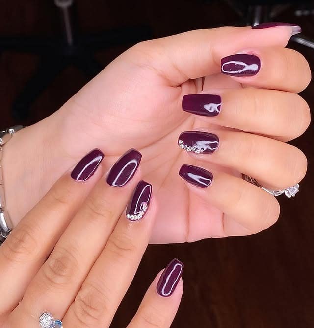 3. Eggplant Shine Square Nails with Minimal Crystals - dark color nail ideas