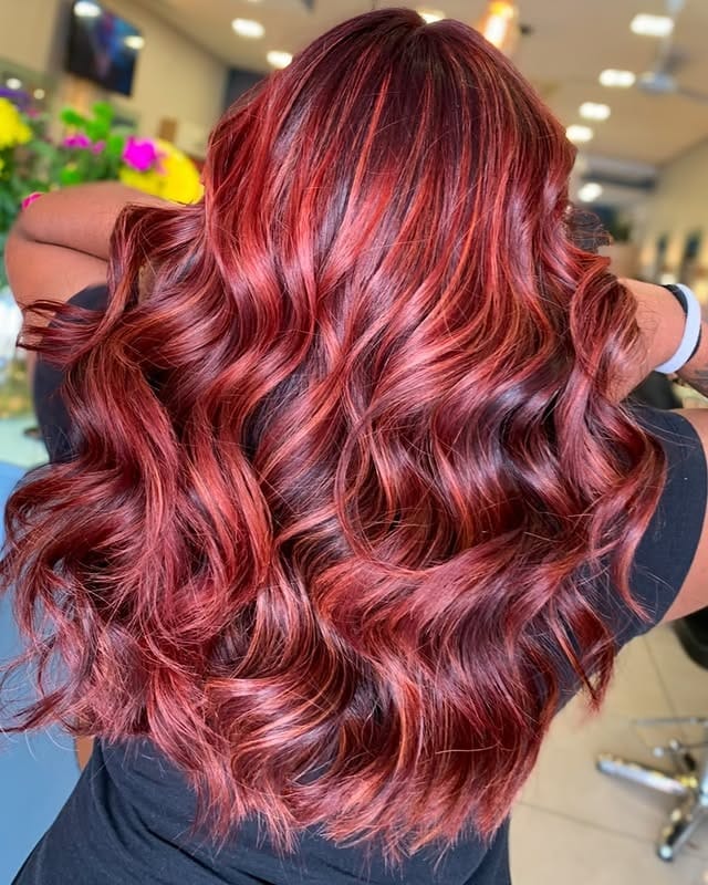 2. Crimson Dimensional Waves with High-Gloss Finish - Red Hair with Highlights