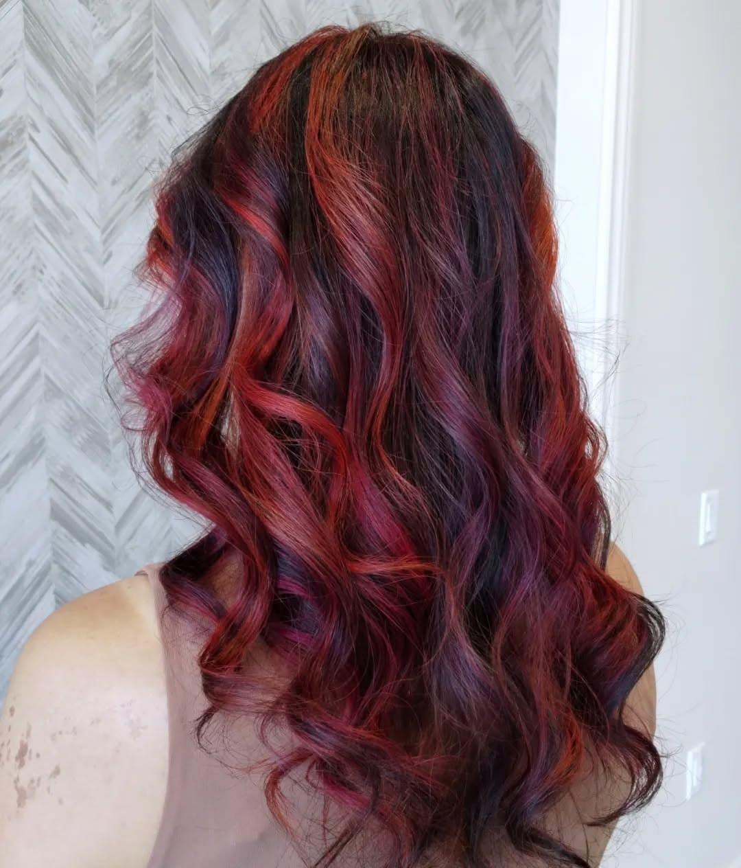 3. Merlot and Ruby Highlight Blend on Loose Curls - Red Hair with Highlights