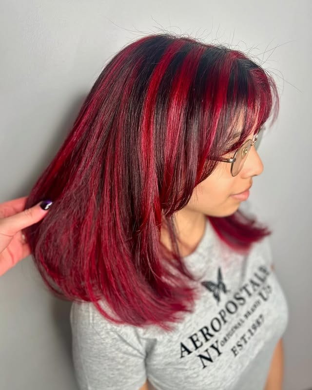 4. Vibrant Red Panel Highlights with Shoulder-Length Layers - Red Hair with Highlights