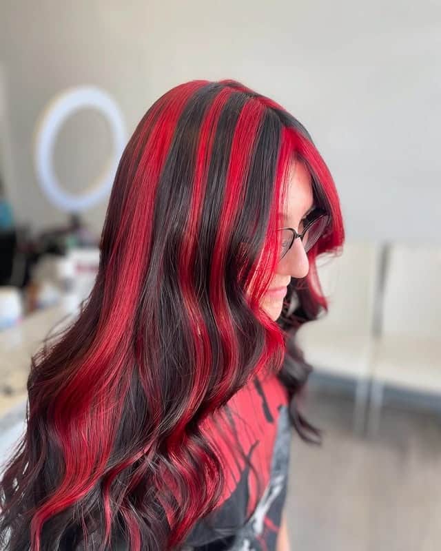 8. Jet Black and Fire Red Dual-Strand Contrast - Red Hair with Highlights