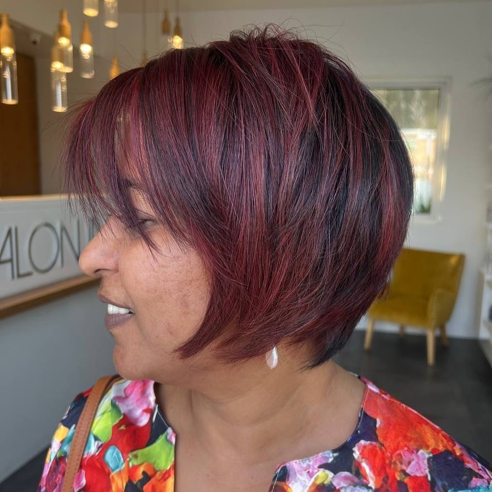 10. Textured Burgundy Pixie Bob with Fine Red Accents - Red Hair with Highlights