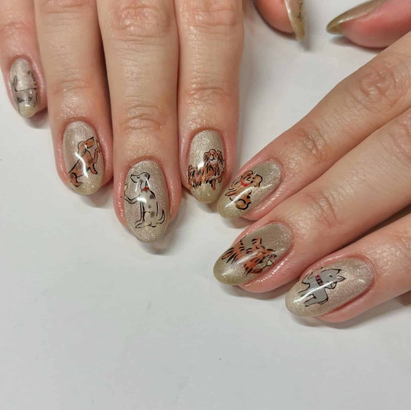 4. Gold Shimmer Dog Sketch Nails - dog nail ideas