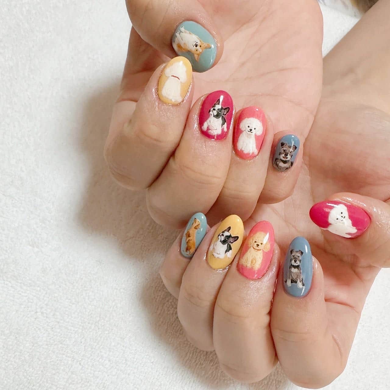 19. Pastel Mix with Hand-Painted Dog Breeds - dog nail ideas