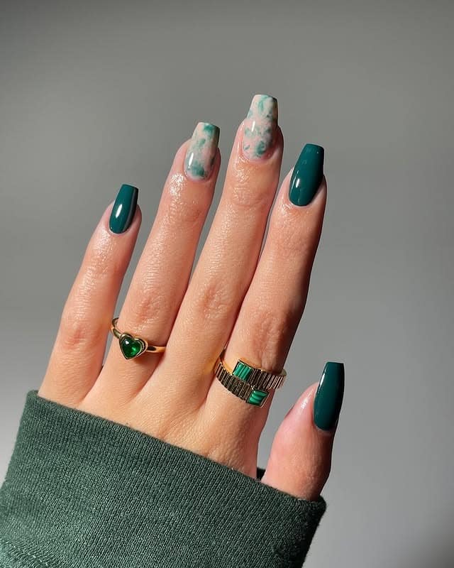 1. Teal Marble Mix With Gloss Emerald Accents - emerald nail ideas
