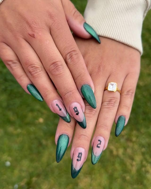 3. Metallic Emerald Reverse French With Number Detail - emerald nail ideas
