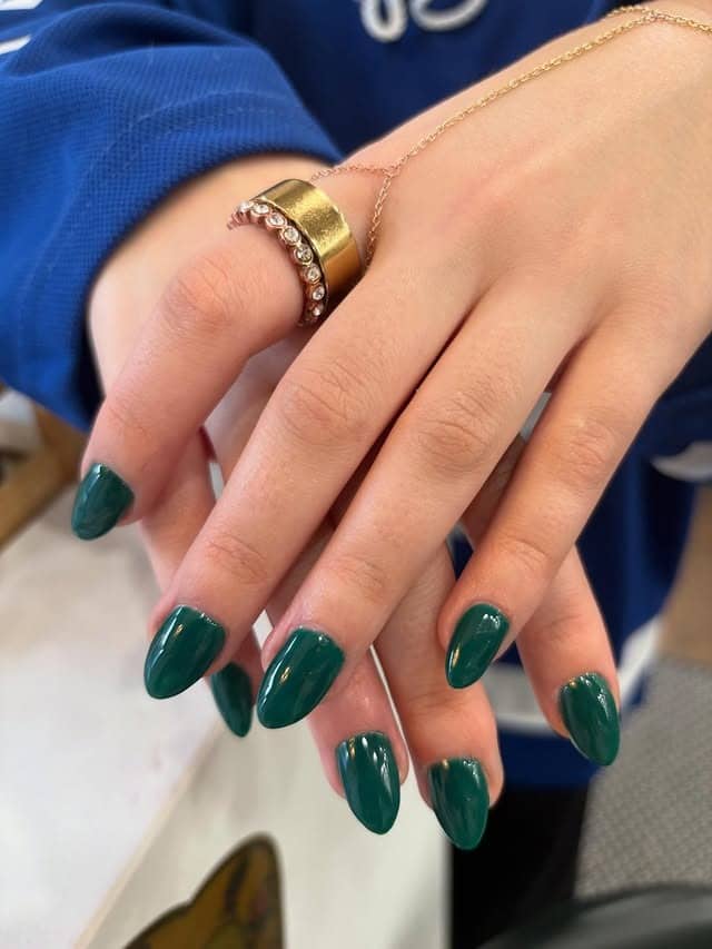 8. Solid Emerald Almond Shine - emerald nail ideas