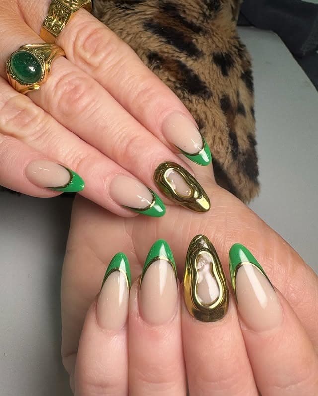13. Green Reverse French Almond Nails With Gold Accents - emerald nail ideas