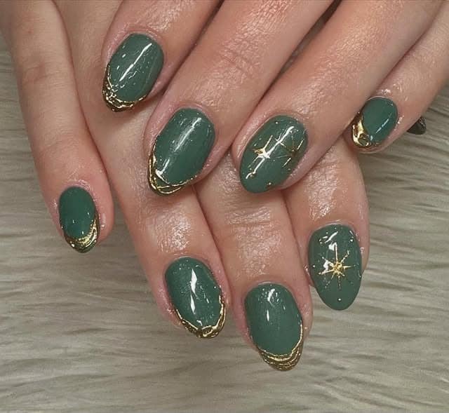 15. Sage Emerald Nails With Gold Foil Edging - emerald nail ideas