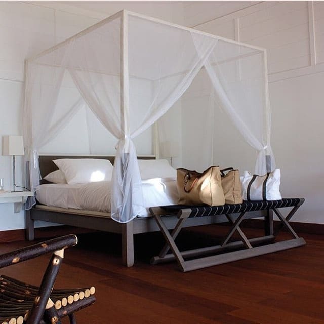 1. Airy Canopy Retreat in Soft Whites - cool bedroom ideas