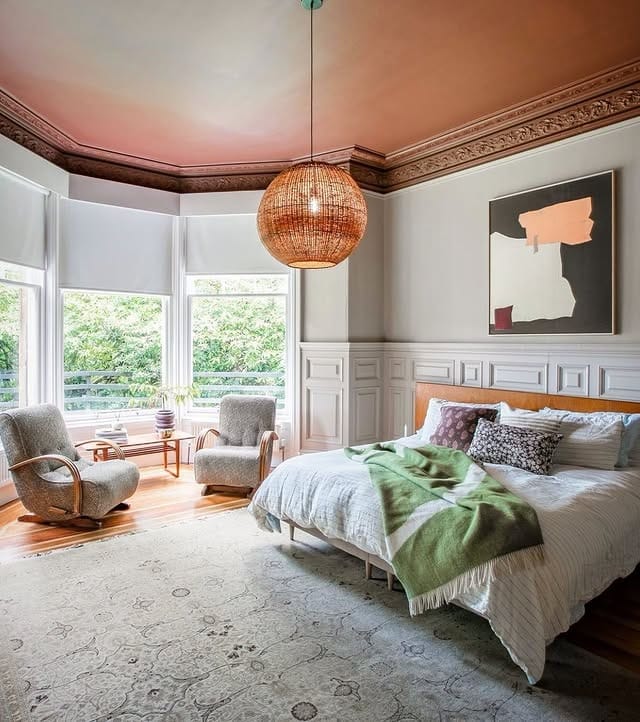 4. Bay-Window Bedroom with Warm Greens and Blush Accents - cool bedroom ideas