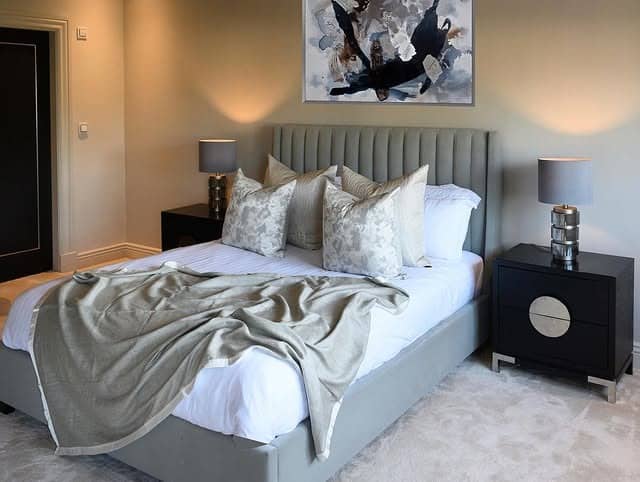 20. Elegant Grey Bedroom with Polished Accents - cool bedroom ideas