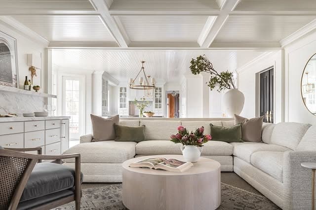 2. Crisp Cream Sectional with Classic Detailing - sectional living room ideas