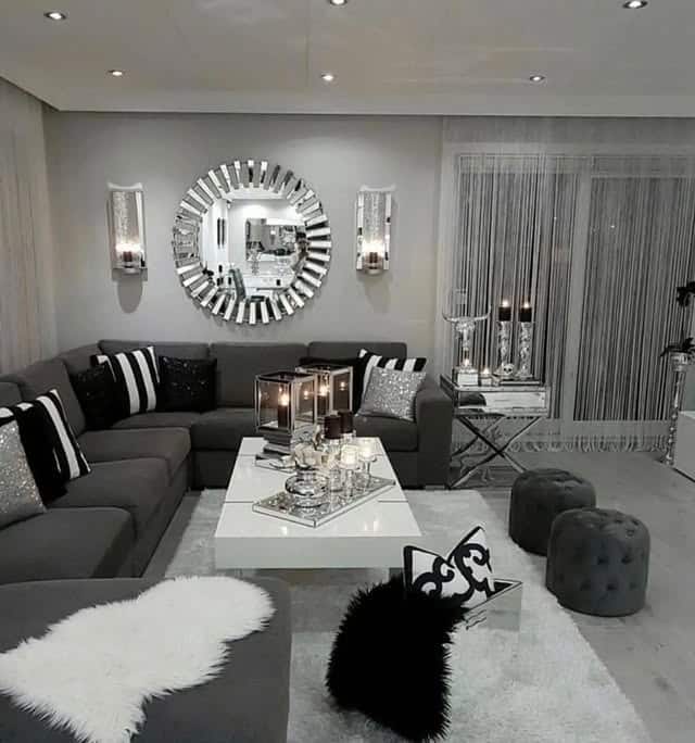 8. Monochrome Sectional with High-Gloss Glam Elements - sectional living room ideas