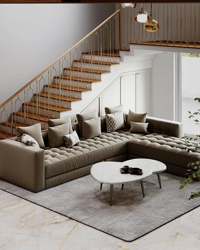 12. Tufted Taupe Sectional in a Modern Stairwell Setting - sectional living room ideas