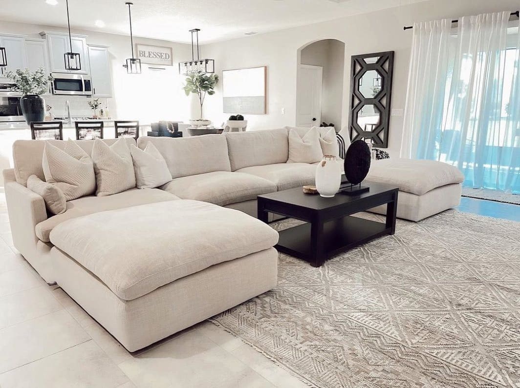 17. Soft Ivory Sectional in a Bright Open Floor Plan - sectional living room ideas