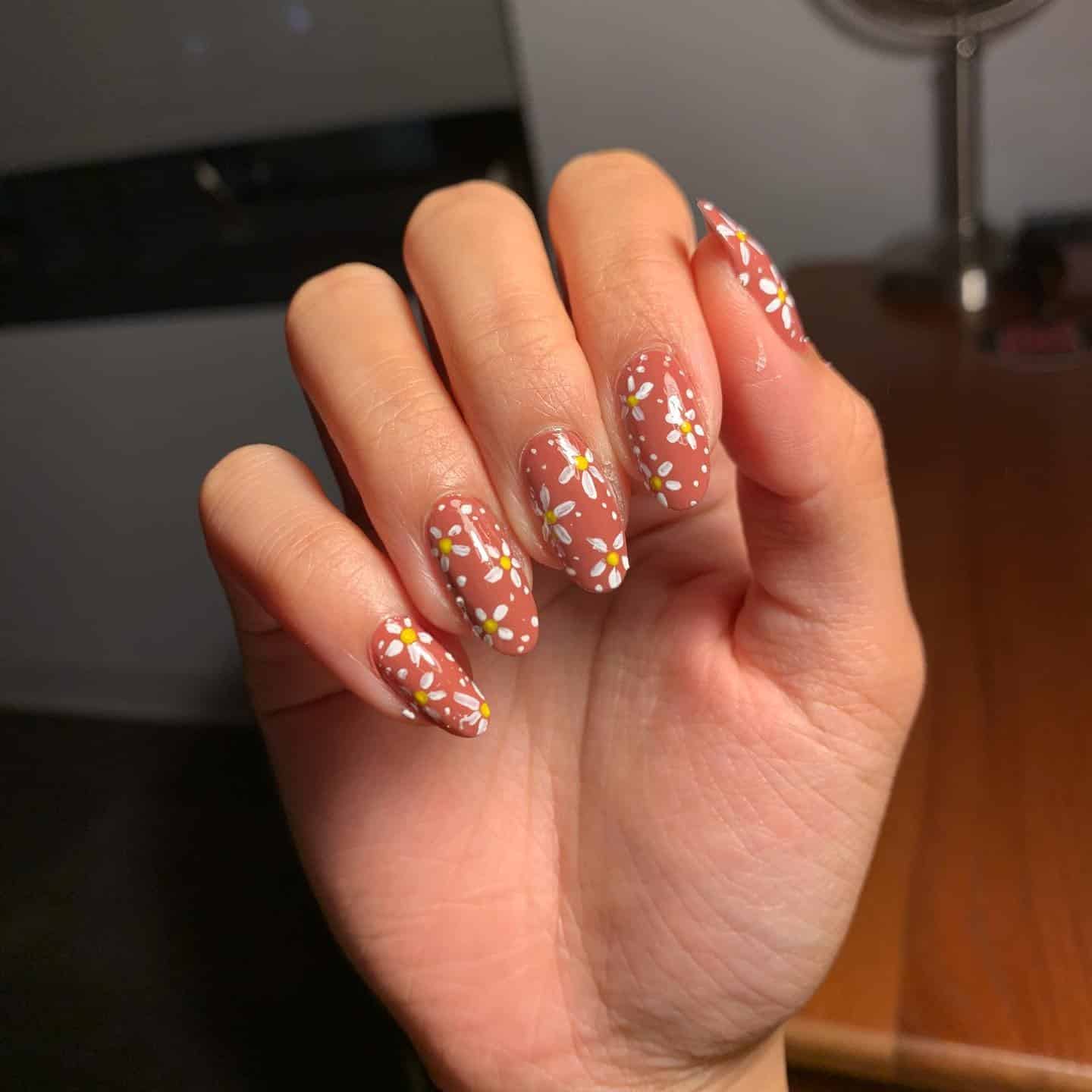 8. Soft Daisy Meadow Almond Nails - fall flower nail ideas