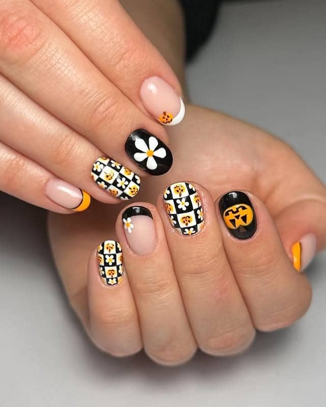 13. Autumn Patchwork Floral Mix Nails - fall flower nail ideas
