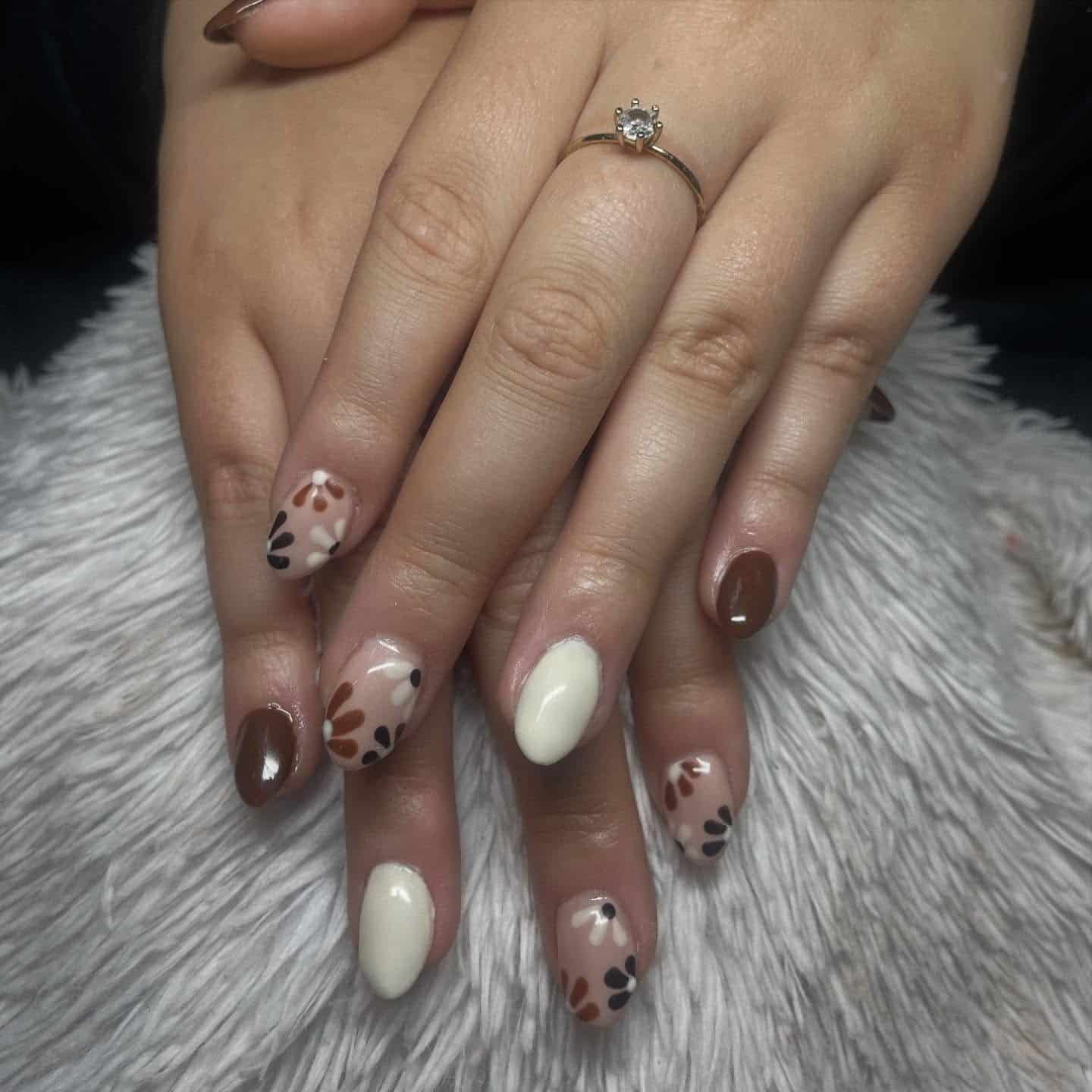 22. Cream & Cocoa Petal Mix Almond Nails - fall flower nail ideas